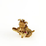 gold dog with shoe charm 