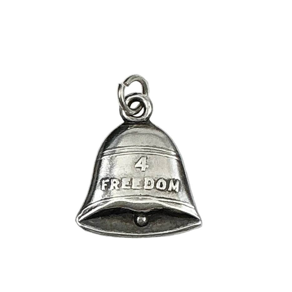 A silver bell-shaped charm pendant engraved with the number 4 and the word FREEDOM, shown on a plain light gray background.