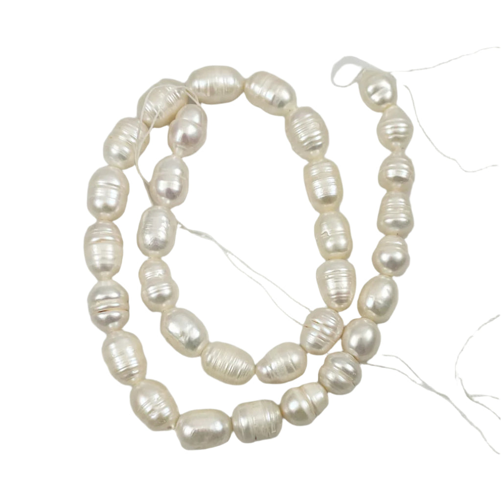 White Freshwater 12mm Oval Pearls Strand