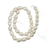 White Freshwater 12mm Oval Pearls Strand