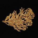 Vintage gold leaf berry brooch