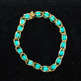 Turquoise and 14K Gold Bracelet by Reuben Pomerantz