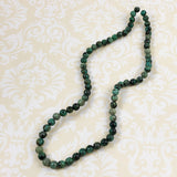 African Turquoise Round Bead Strands