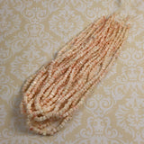 Angel Skin Coral Beads Graduated Strand