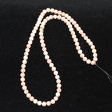 angel skin coral round beads