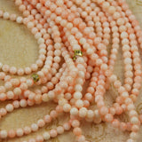 Vintage angel skin coral round beads