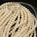 Italian white coral beads round