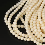Italian white coral beads round