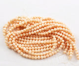 Angel Skin Coral Round Beads