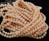 Angel Skin Coral Round Beads