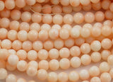 Angel Skin Coral Round Beads