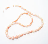 Angel Skin Coral Carved Tulip Beads (12)