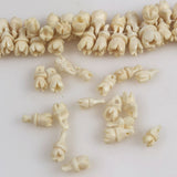 Carved bone flower beads