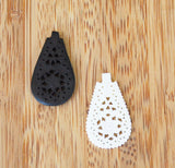 Black and White Pierced & Carved Bone Pendants Vintage