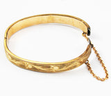 Gold Hinged Bracelet with Floral Design