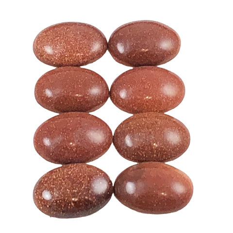 Goldstone oval cabochons