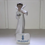 Lladro boy with display sign