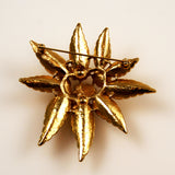 Vintage Monet gold floral brooch