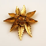 Vintage Monet gold floral brooch