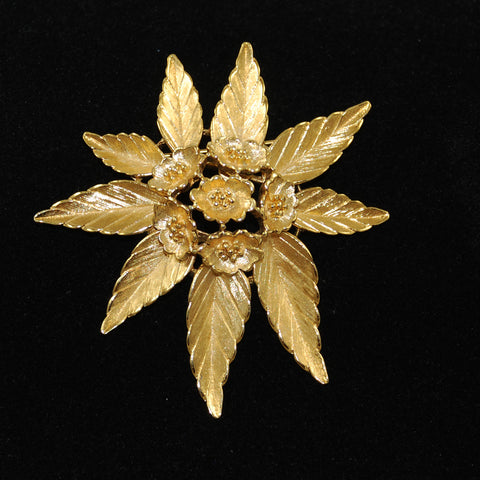 Vintage Monet gold floral brooch