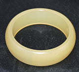 This retro bangle reminds me of the 1950's. A wonderful pale lemon yellow Vintage Moonglow Lucite bangle bracelet. 