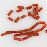 antique orange coral tube beads