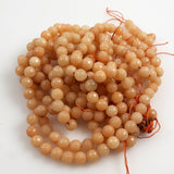 Peach Jade Faceted 8mm Round Beads