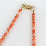 salmon pink coral gold necklace