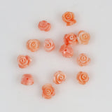 carved pink coral roses