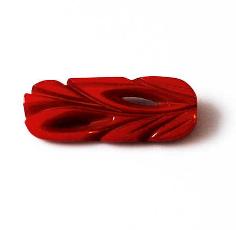 Red Bakelite Art Deco Carved Pin