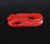 Red Bakelite Art Deco Carved Pin