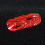 Red Bakelite Art Deco Carved Pin