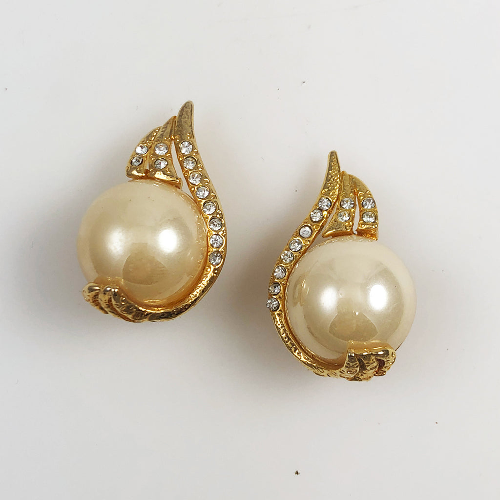 Gold clip earrings and white rhinestones