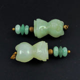 Chinese carved jade cat pendant