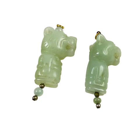Carved jade tiger pendant