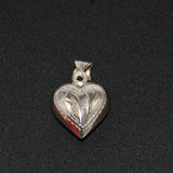 Victorian puffy heat charm sterling silver