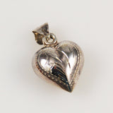 Victorian puffy heat charm sterling silver