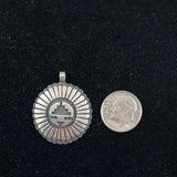 Hopi Sun Face Sterling Pendant by Mark Tawahongva