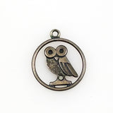 Silver owl charm Rice University