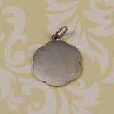 Back of Sterling Silver Sixteen Charm Vintage