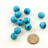 Turquoise satin glass beads